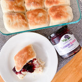 Carmel Berry Elderberry Blueberry Preserves jar with baked goods