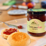 Carmel Berry Elderflower Pluot Preserves jar with baked goods
