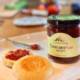 Carmel Berry Elderflower Pluot Preserves jar with baked goods