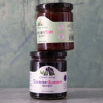 Carmel Berry Elderflower Pluot Preserves and Elderberry Blueberry Preserves jars