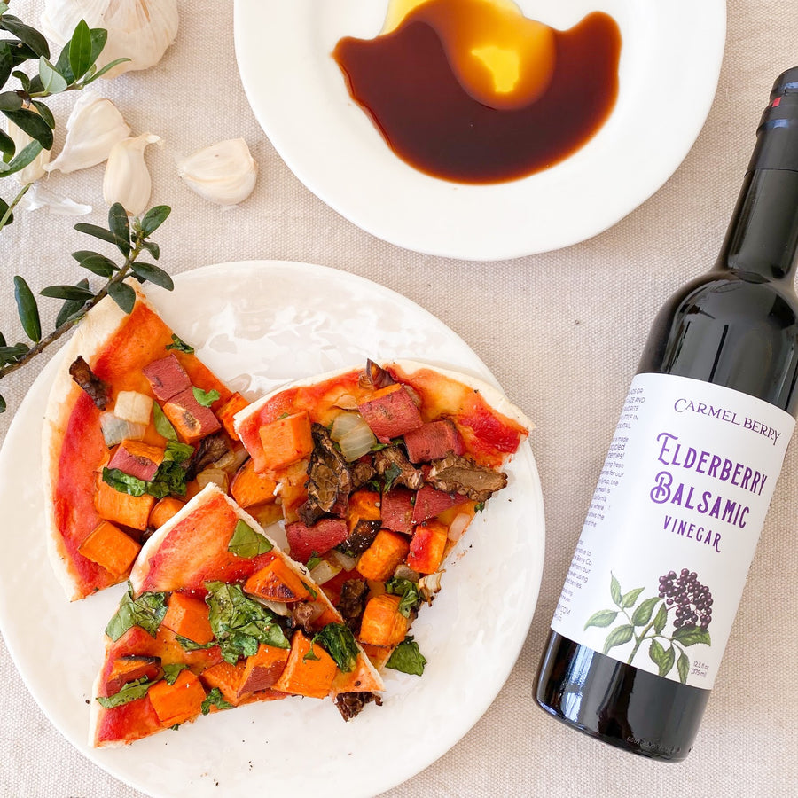 Carmel Berry Elderberry Balsamic Vinegar bottle and pizza