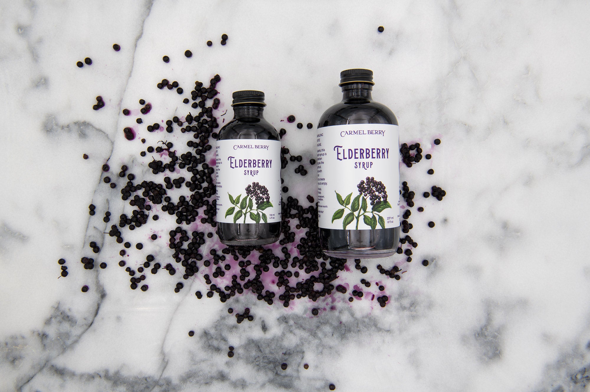 Carmel Berry Elderberry Syrup 4oz and 8oz bottles